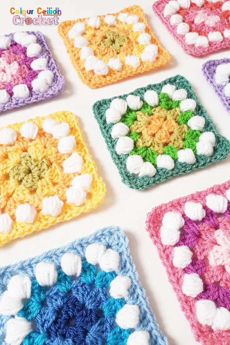 Colorful and cheerful granny squares with granny and puff stitch.