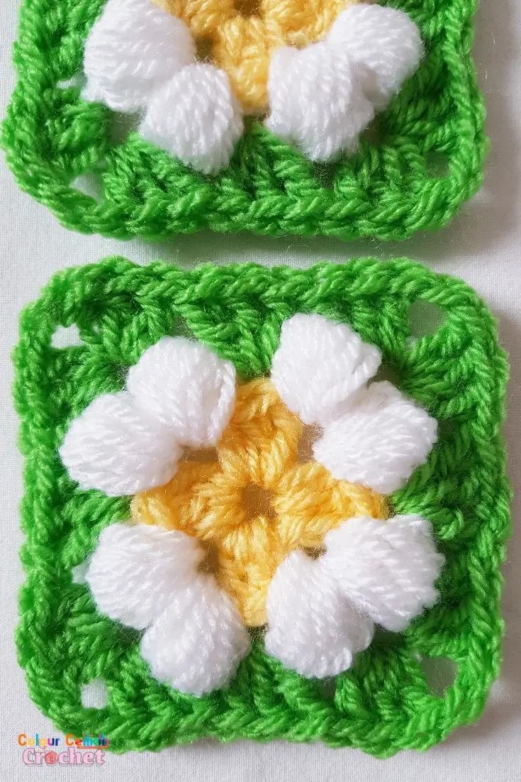 This is an easy crochet puff daisy granny square pattern for a small daisy flower in bright and cheerful colours.