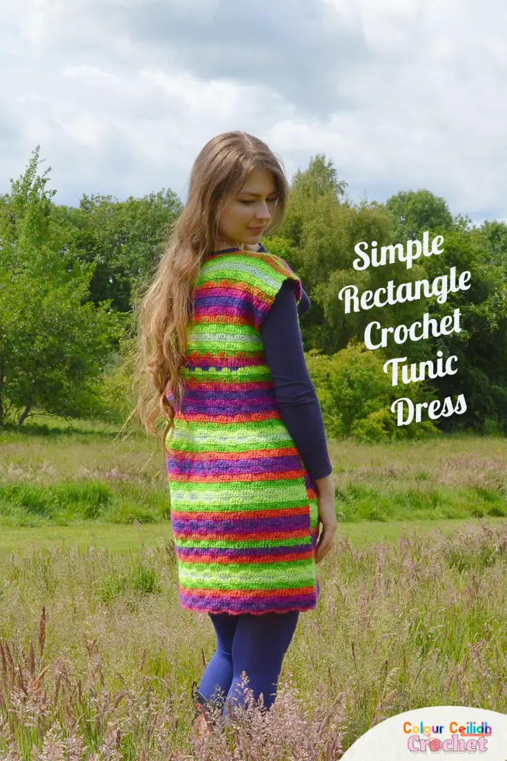 This crochet tunic dress pattern with sleeves is a simple rectangle seamed at the sides and shoulders. Click for the free pattern and diagram. This easy beginner crochet tunic dress only uses single and double crochet stitches to create a subtle wavy stitch pattern to make the usual stripes a little more interesting. I love the super simple shape which looks great as is or you could belt it too. I love how it frames my shoulders and creates loose fitting comfortable sleeves without even trying.