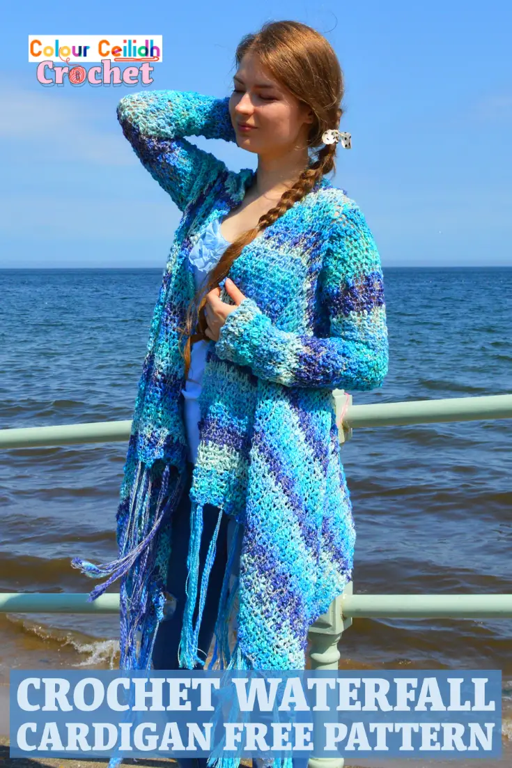 This easy crochet cardigan pattern Waterfall is a free pattern and is perfect for a relaxed summer day at the beach. Using a super simple double crochet stitch, the body is worked in a rectangle and then the sleeves and the tassel fringe are added. The asymmetric hem is playful and fun. Net like stitch, texture that reminds me of the sea waves, blue ocean colors, waterfall drape... What a creative experience! It's like I'm weaving the landscape of the sea around my shoulders. #crochetcardigan