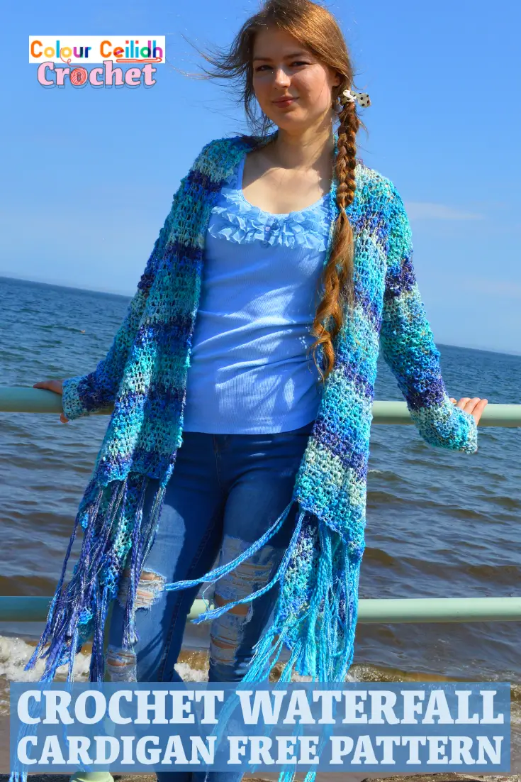 This easy crochet cardigan pattern Waterfall is a free pattern and is perfect for a relaxed summer day at the beach. Using a super simple double crochet stitch, the body is worked in a rectangle and then the sleeves and the tassel fringe are added. The asymmetric hem is playful and fun. Net like stitch, texture that reminds me of the sea waves, blue ocean colors, waterfall drape... What a creative experience! It's like I'm weaving the landscape of the sea around my shoulders. #crochetcardigan