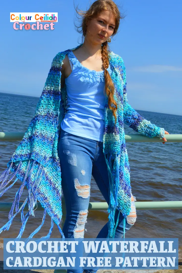 This easy crochet cardigan pattern Waterfall is a free pattern and is perfect for a relaxed summer day at the beach. Using a super simple double crochet stitch, the body is worked in a rectangle and then the sleeves and the tassel fringe are added. The asymmetric hem is playful and fun. Net like stitch, texture that reminds me of the sea waves, blue ocean colors, waterfall drape... What a creative experience! It's like I'm weaving the landscape of the sea around my shoulders. #crochetcardigan