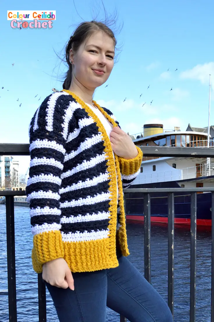 Without having to cut the yarn between stripes, this feminine crochet nautical cardigan is super easy and enjoyable to make. I can't tell you how much fun I had using just half double crochet and double crochet stitches to create such a beautiful effect between the stripes and a subtle kind of cable-y and lacy effect going on in the navy stripes! And of course it's super fast to make, because I'm using good old tried and tested stitches. What is more, this crochet cardigan pattern is free and includes an easy Youtube video tutorial, where you can see the close up of the fabric.