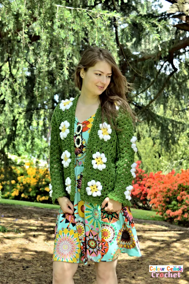 This fun & easy beginner crochet daisy granny square cardigan comes in 9 sizes. The daisy granny square is worked almost the same as the traditional granny square as the daisy flowers are made with the bobble stitch. This crochet cardigan jacket pattern features a simple shell border & includes links to the video and photo tutorials that explain how to change color without any tails and how to join granny squares together. This free crochet pattern includes a YouTube video tutorial as well.