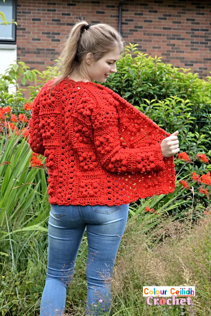 Pick your favourite shade for this easy crochet granny square cardigan which provides surface interest through bobble stitches that look great even when made all in one color. This one color granny square cardigan crochet pattern is free, it comes in 9 sizes & includes a YouTube video as well.
