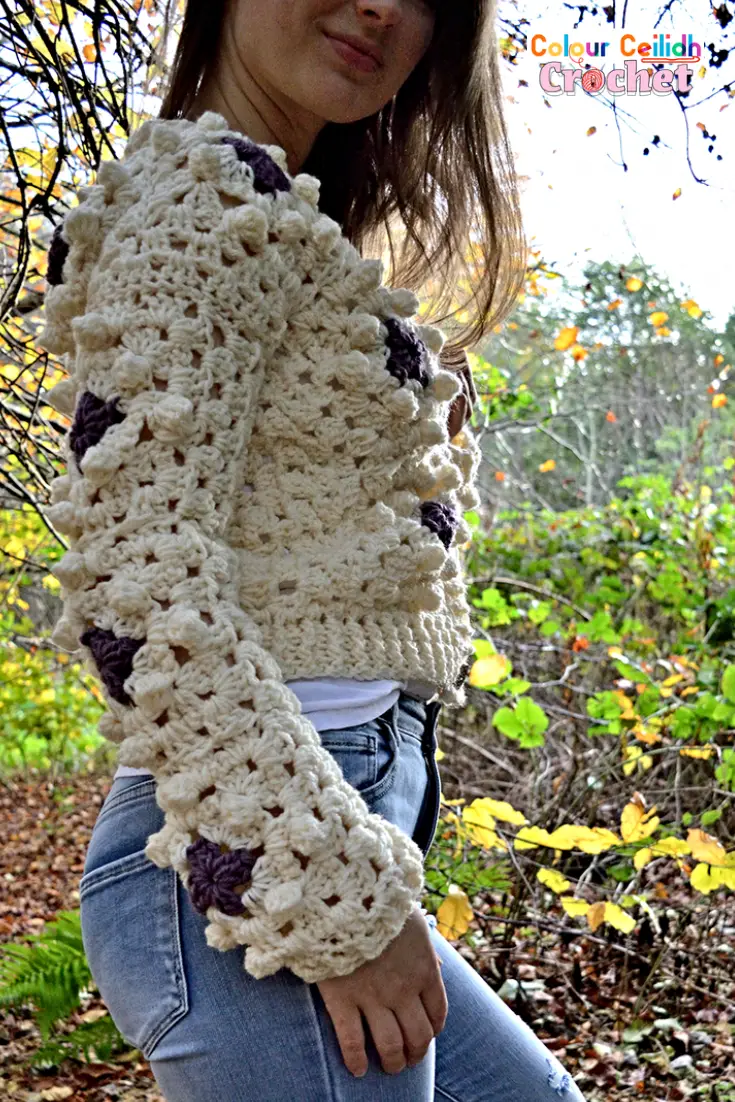 This bobble stitch crochet cardigan Bobble Diamonds is made with bobble stitch granny squares. Featuring a shorter crop length and chunky ribbing, this crochet granny square cardigan brings nostalgia and bobbles of coziness to your wardrobe.